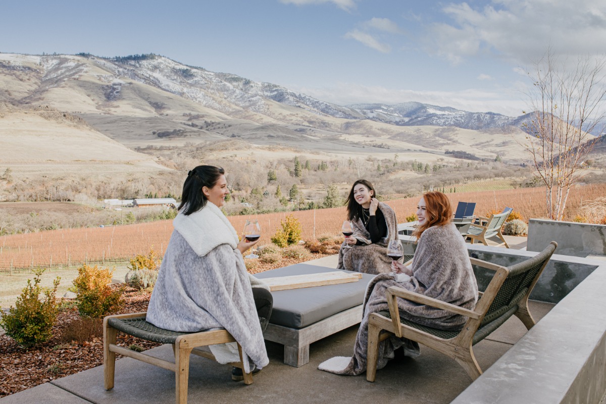 Friends enjoying wines at Irvine & Roberts Vineyards